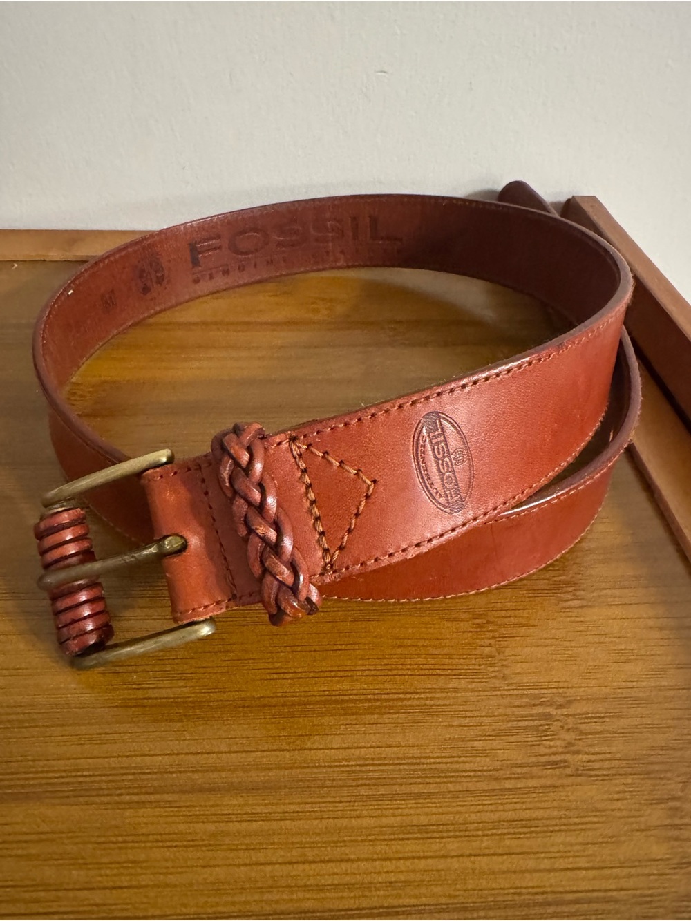 Women’s vintage Fossil genuine leather belt in a cognac or tan brown shade